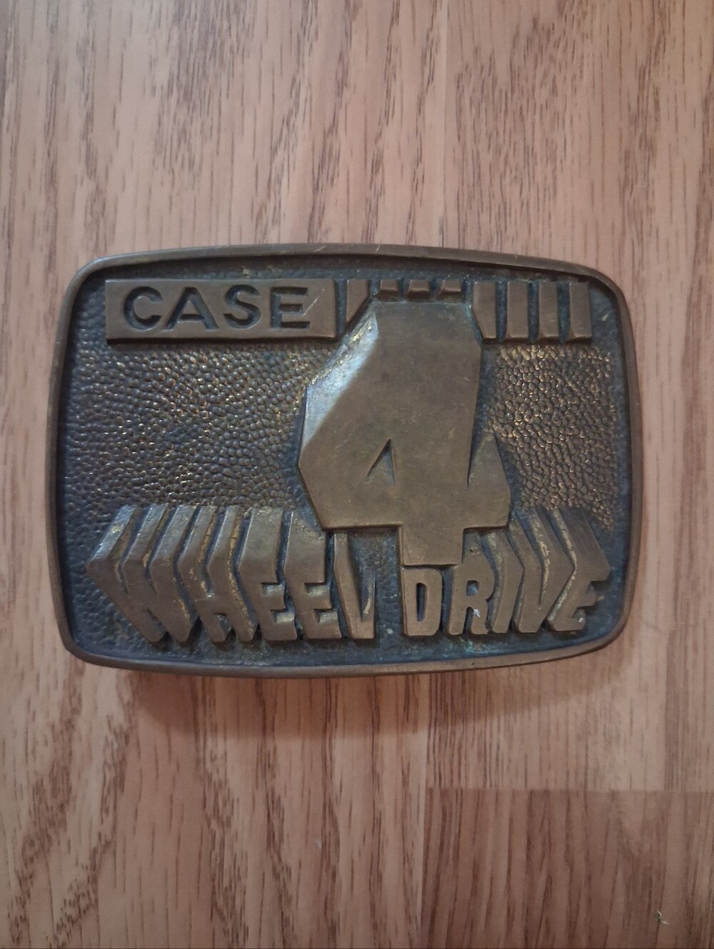 VINTAGE 1970's "CASE 4 Wheel Drive" solid brass belt buckle.